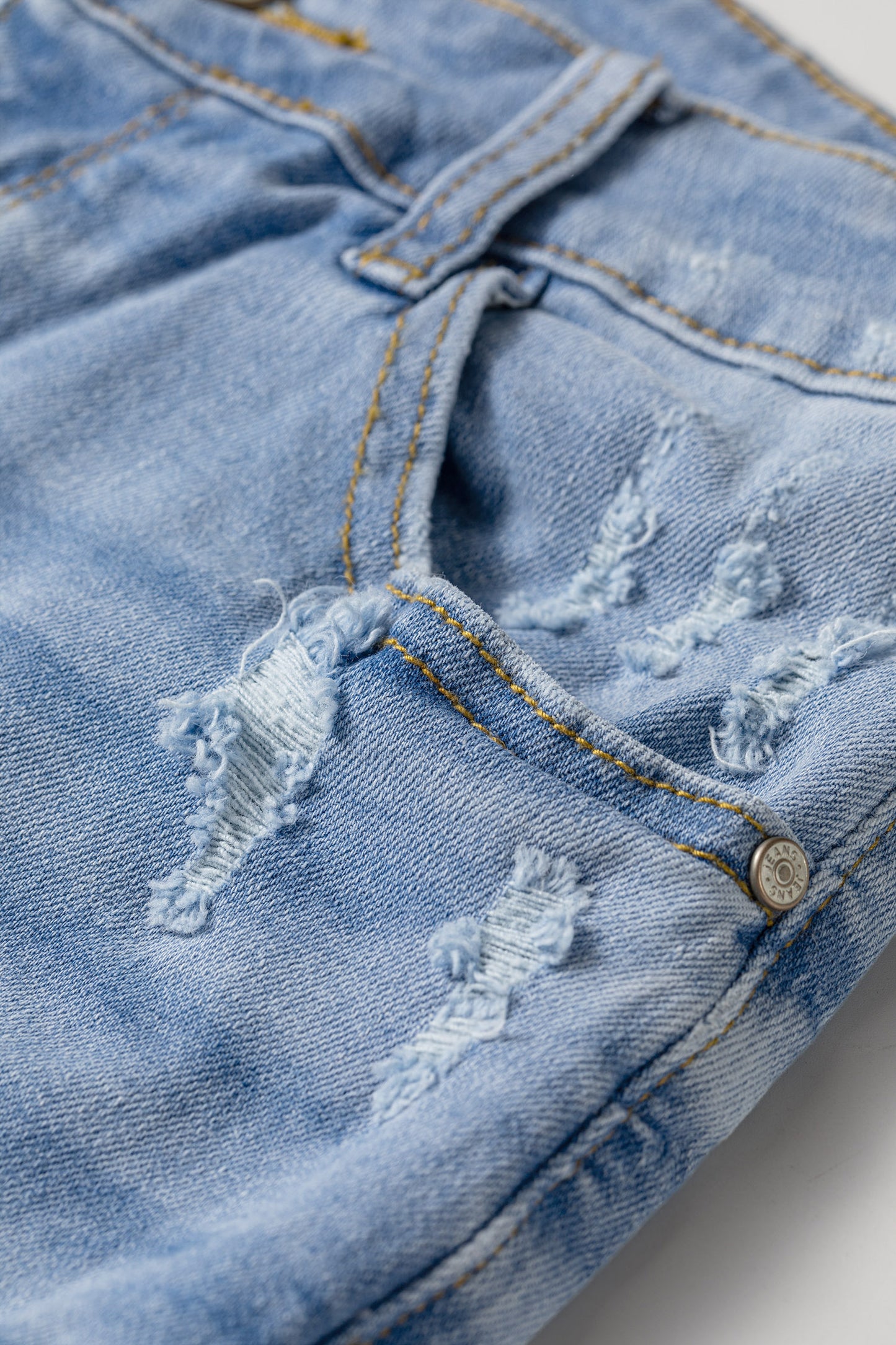 Sail Blue Asymmetric Raw Hem Distressed Whiskery Denim Shorts